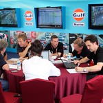 Post-session debrief in the sponsor's hospitality area in Macau