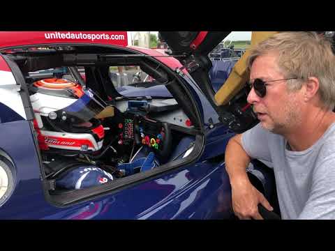 Christian England back in a race car